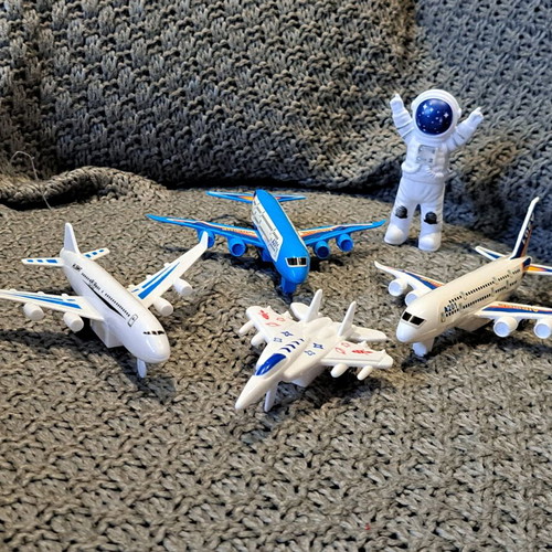 Plastic airplane set, spaceship and astronaut used