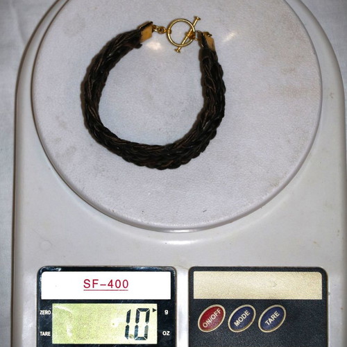Jewelry bracelet made of genuine leather with 22K gold-plated clasp