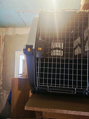 Travel crate used for medium-sized dog up to 30kg