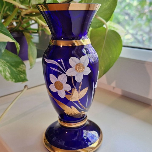 Blue vase with gold ornaments like new, solid glass