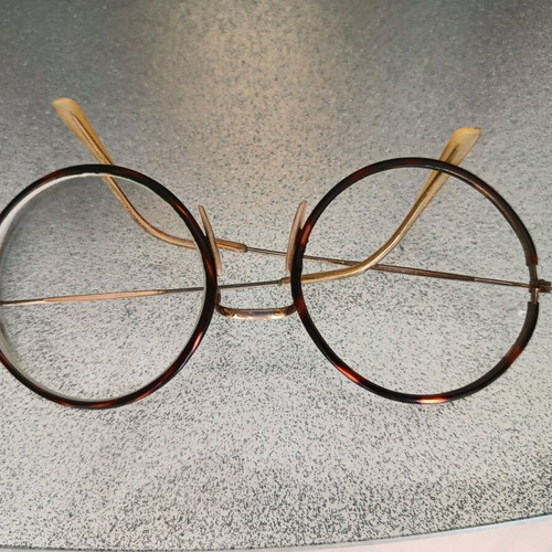 Eyeglasses used, very lightweight, gold color
