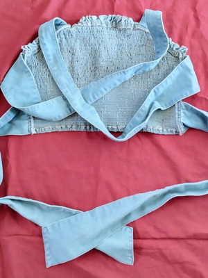 Denim women's top used with crisscross back and tie belt
