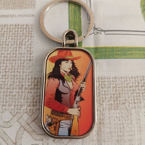 Set of 3 double-sided keychains with Jim Adams and Diana