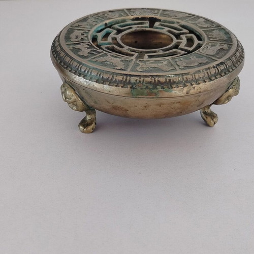 Metal incense burner used with decorative elements from the Chinese zodiac