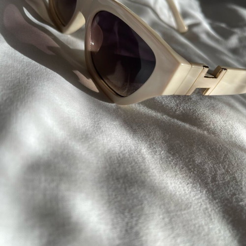 Sunglasses new, beige with metal decoration