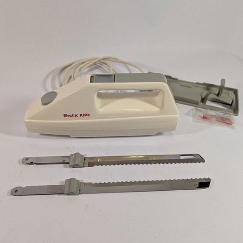 Electric kitchen knife used with 2 double serrated blades and wall mount
