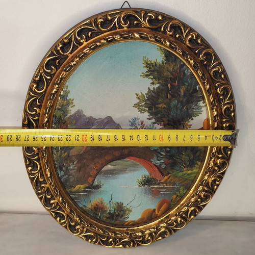 Oval vintage painting on canvas with golden frame used