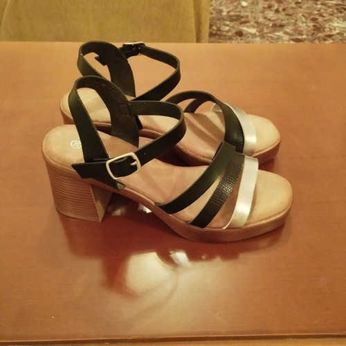 Sandal size 38 black and silver like new with strap and low heel