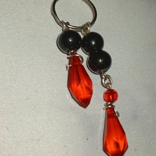 Handmade magic keychain in black and red