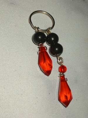 Handmade magic keychain in black and red
