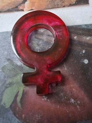Plastic sign female symbol like new
