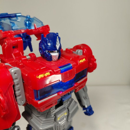 Transformers One Power Flip Optimus Prime Hasbro used, missing parts, light works