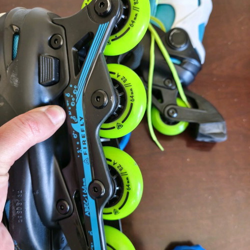 Inline Roller Firefly ABEC 1 64 mm adjustable size 29-32 with Globber protective gear like new