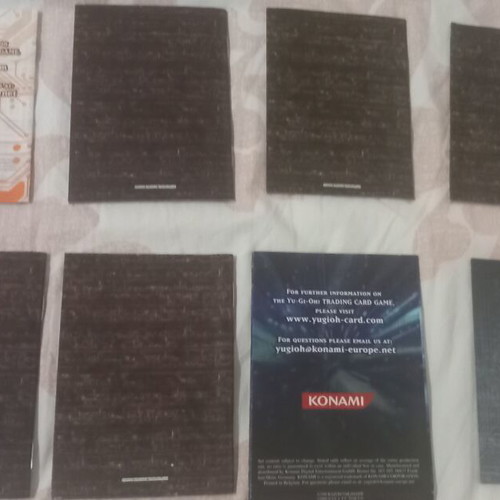 Yu-Gi-Oh! rule books and deck zones, like new, set of 14 each