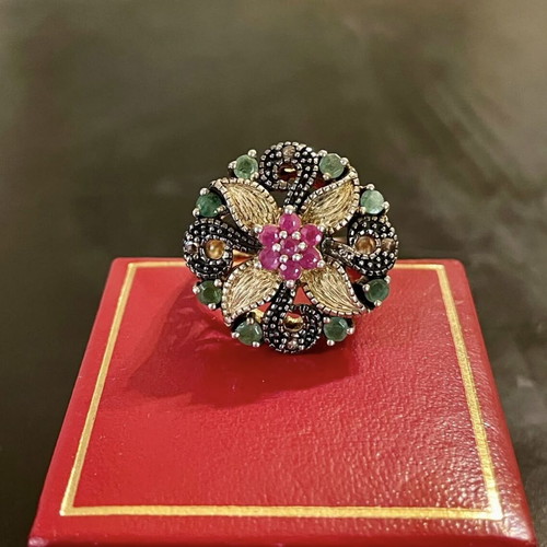 Silver-gold ring like new with emeralds and rose cut diamonds