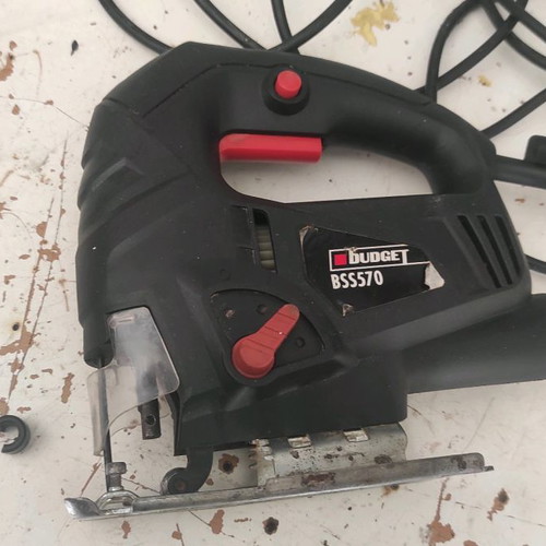 Electric jigsaw used with broken part
