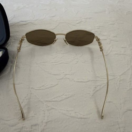 Gucci women's sunglasses GG1802S 005 with gold metal frame and brown lenses new