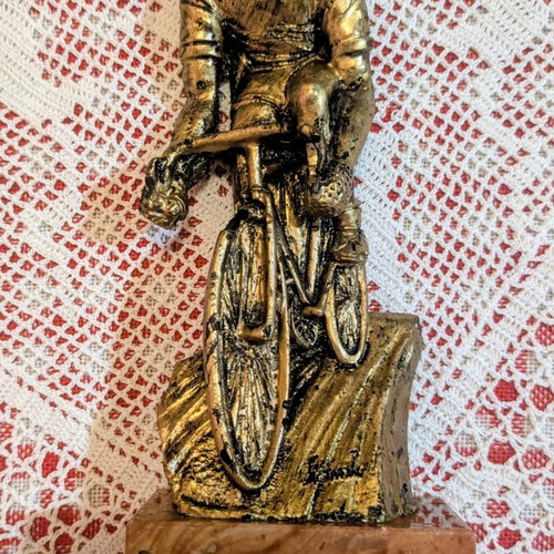 Vintage decorative cyclist figurine on marble base