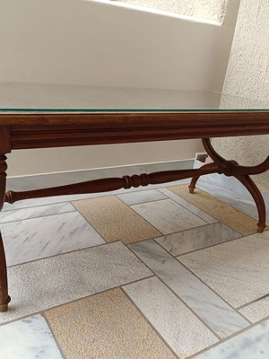 Coffee table used, wooden with protective glass