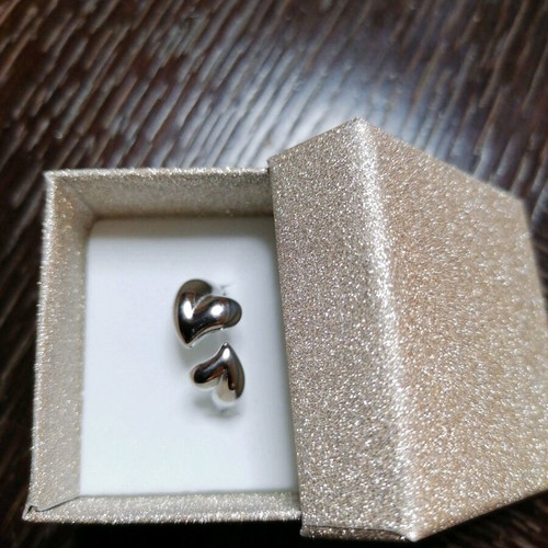 Steel ring with hearts new, silver color