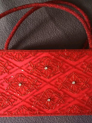Red evening handbag new decorated with beads