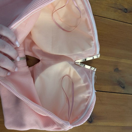 Pink bustier with gold detail and zipper, size small