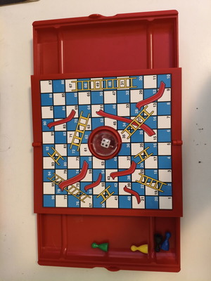 Snakes & Ladders travel board game like new with built-in dice