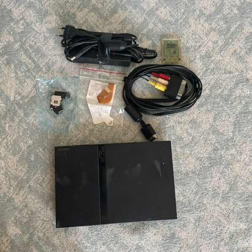 PlayStation 2 used for spare parts with controller and chip