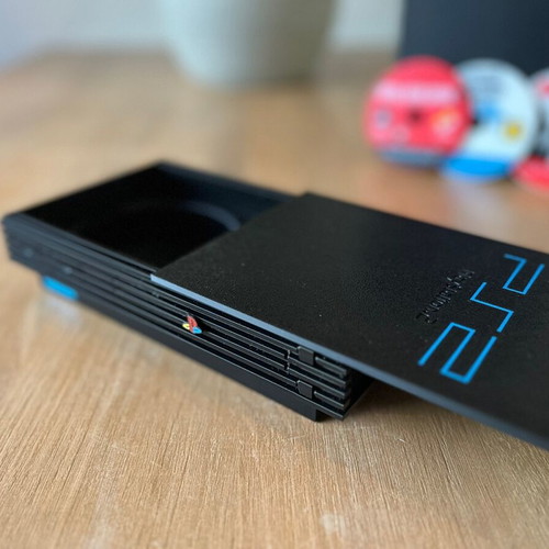 PlayStation 2 κονσόλα καινούργια με cd για σουβέρ