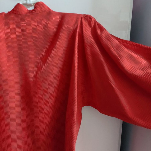 Red satin shirt with checkered cube patterns, size M, used