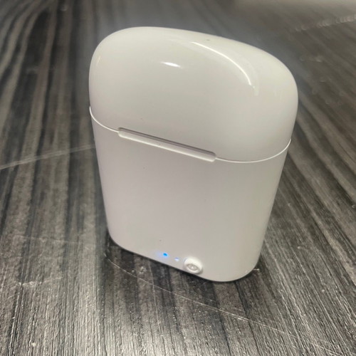 Wireless earbuds white used with charging case