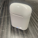 Wireless earbuds white used with charging case