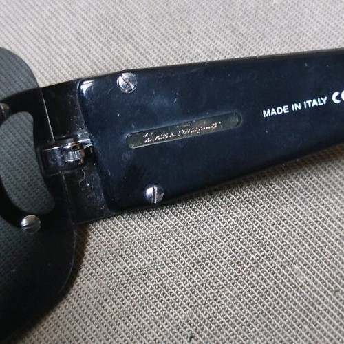 Salvatore Ferragamo glasses case with used glasses, broken arms