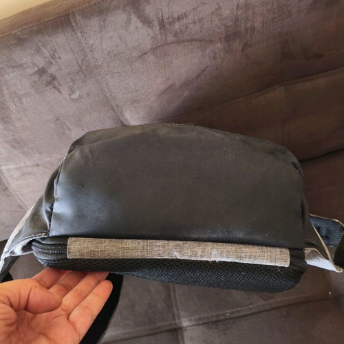 NOD anti-theft backpack used, gray with laptop compartment and USB
