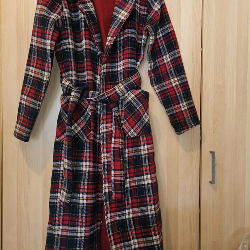 Checked coat size Small like new with belt and stitched pockets