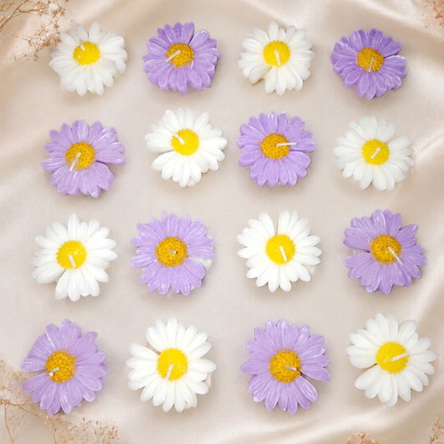 Handmade decorative daisy candles in white and purple