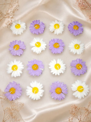 Handmade decorative daisy candles in white and purple