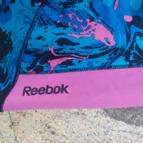 Reebok Play Dry sports leggings size S like new, blue and pink abstract