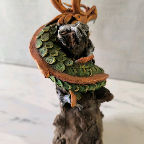 Wooden dragon handmade used with painted details
