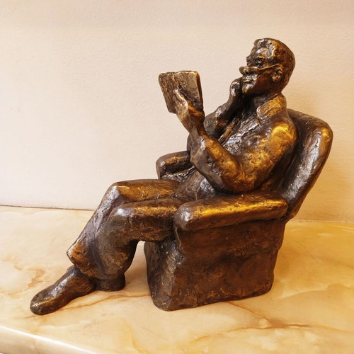 Sculpture of a Man Reading a Book, New