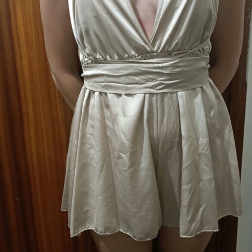 One-piece mini romper like new, gold with crisscross back
