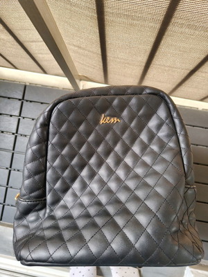Kem black quilted backpack used with two compartments