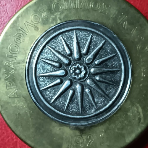 Collectible metal paperweight with Vergina Sun used