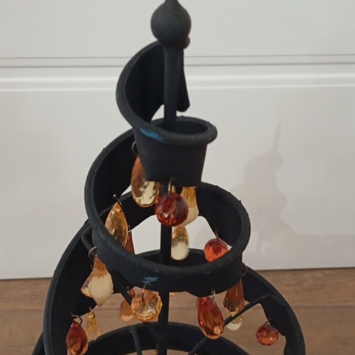 Black metal candle holder with 3 candle slots