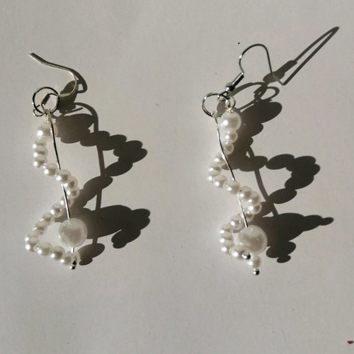 Earrings made of small beads in spiral shape new