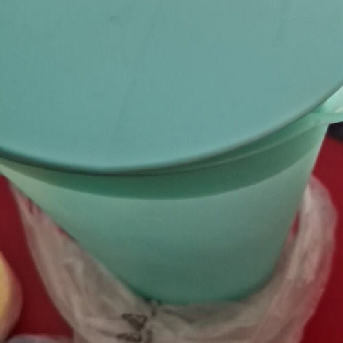 Tupperware pitcher with 4 glasses and lid new
