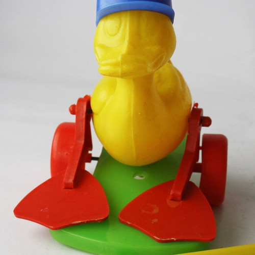 Plastic wheeled vintage 70's duck toy new with stick