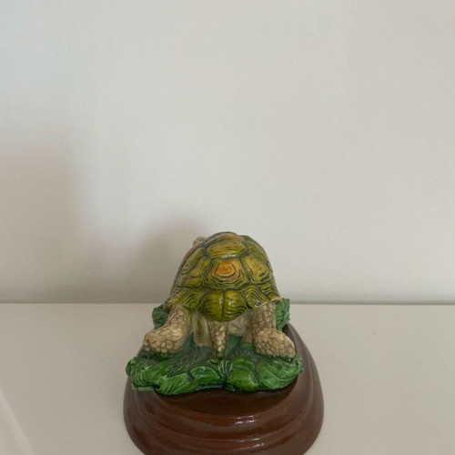 Porcelain turtle on wooden base like new