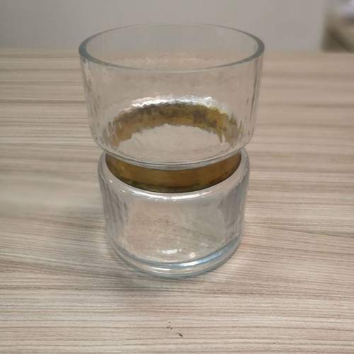 Decorative glass candle holder vase used with gold design