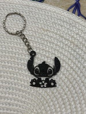 Stitch keychain like new, black color